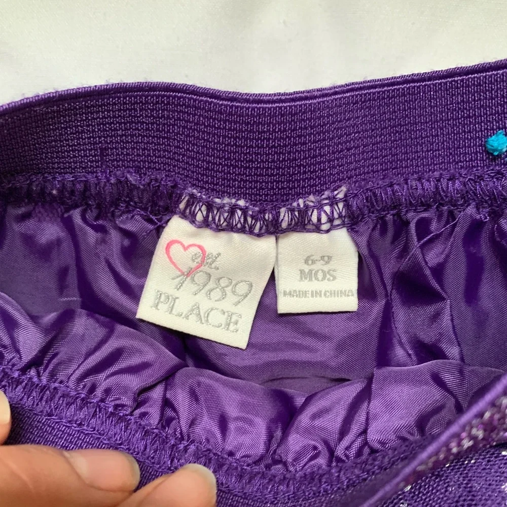 The Children’s Place purple sparkly ruffle skirt 6-9 months